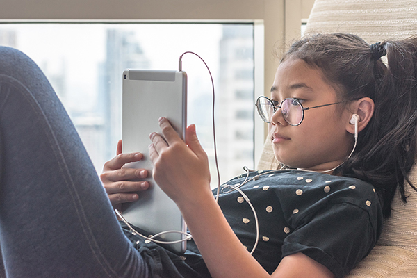 Photo of child on tablet