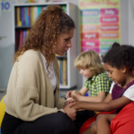 Teacher comforting Sturdent