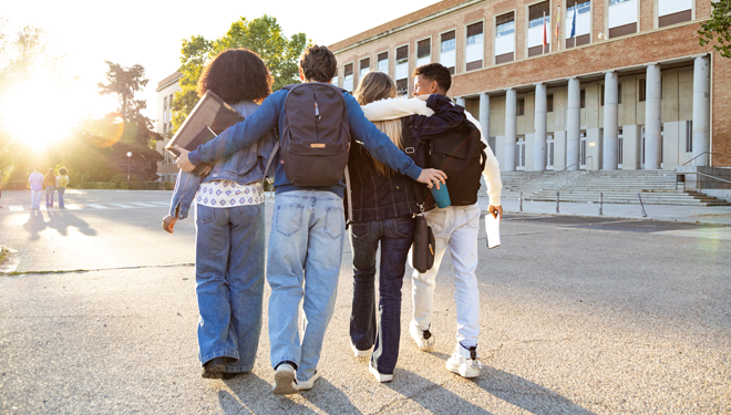 Students walking on school campus together